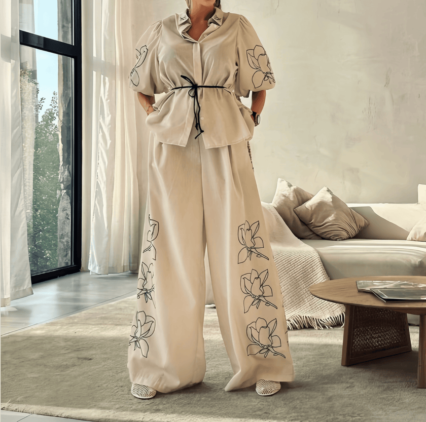 Cream wide-leg pant set with puff sleeves, tie waist blouse and floral embroidery