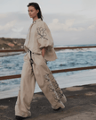 Cream floral embroidered puff-sleeve twin set with wide-leg pants