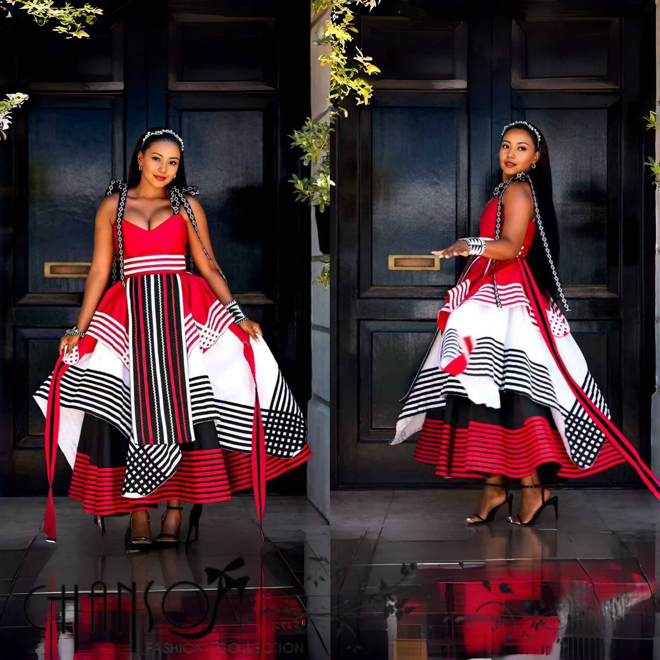 Geometric print maxi dress in red, white, and black; full flared skirt, strappy bodice
