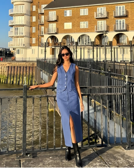 Light-blue denim sleeveless twin set with mandarin collar, button vest and long skirt