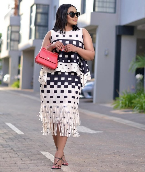 Black-and-white geometric fringe midi skirt with square check blocks