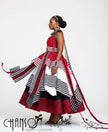 Back view of red African maxi dress with geometric stripe panels and flowing hem
