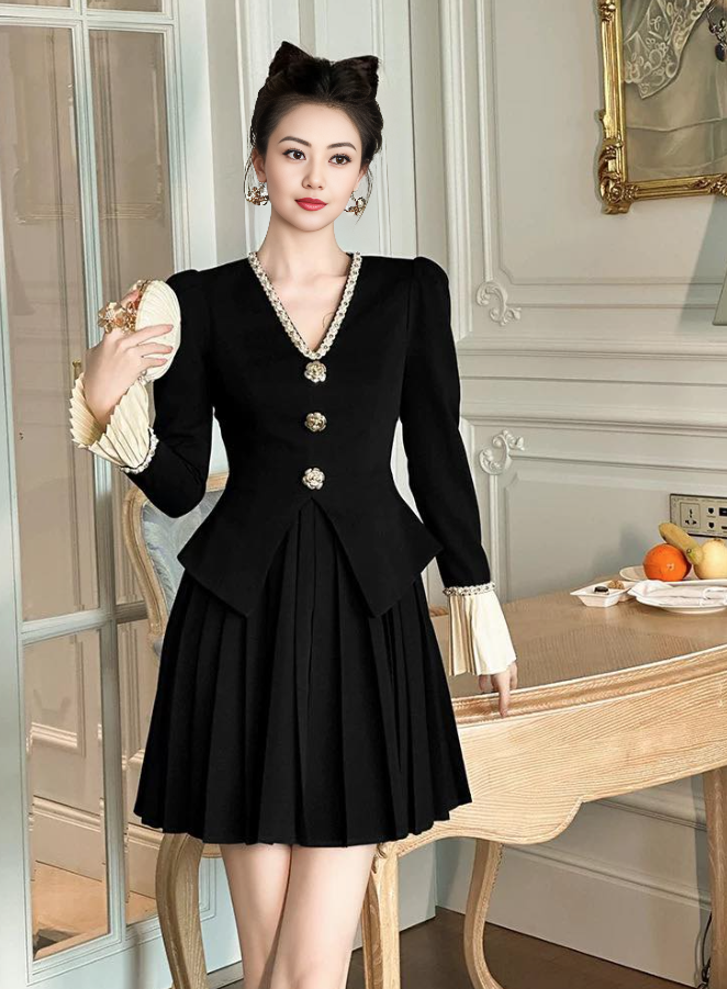 Black pleated V-neck puff-sleeve dress with pearl trim and decorative buttons