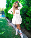 White blazer and pleated skirt twin set with crop top