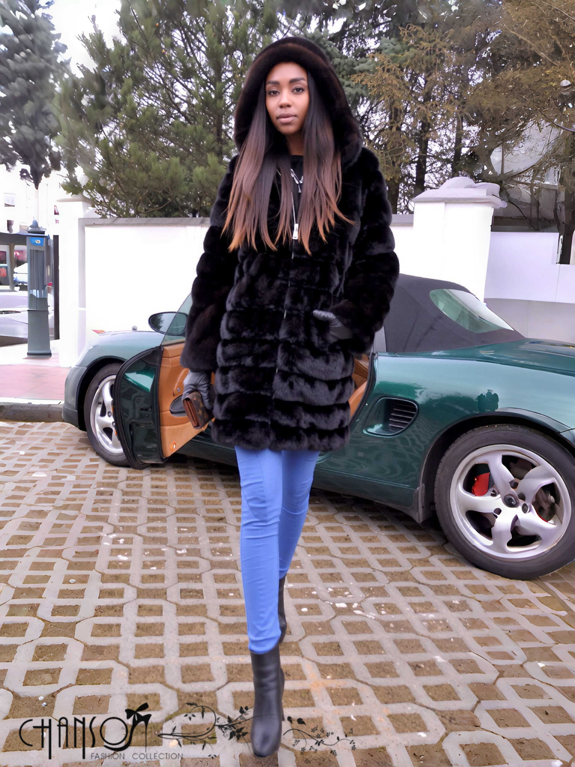 Black hooded faux-fur coat with zip front and chunky textured sleeves