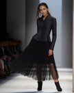 Black pleated midi skirt with matching peplum button-front jacket, long sleeves