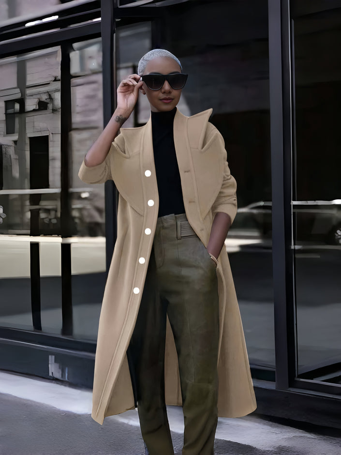 Tan double-breasted long coat with notch lapels and visible buttons