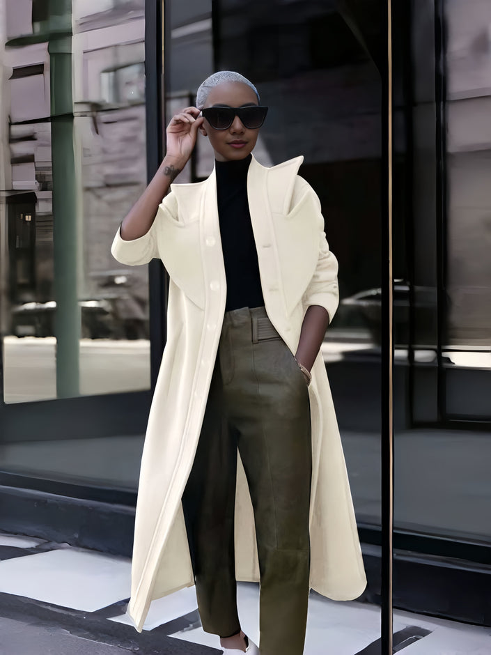 Cream double-breasted long coat with notch lapels and button front