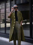 Army-green double-breasted long coat with notch lapels and visible buttons