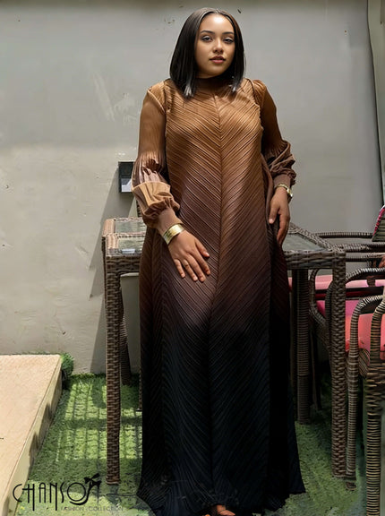 Brown pleated maxi dress with gradient texture and puff sleeves, long A-line fit