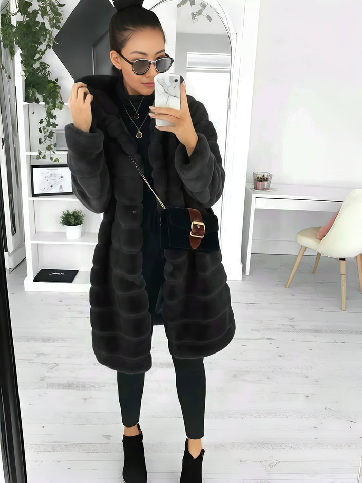 Long black fur hooded coat with button front and long sleeves