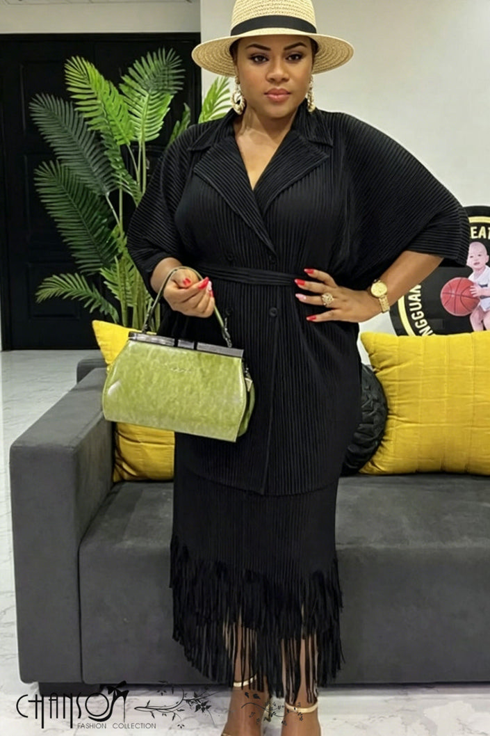 Black pleated twin set with V-neck top and matching fringe skirt, belted waist