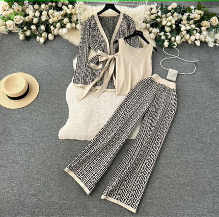Cream patterned knit cardigan, sleeveless vest, and wide-leg trouser set