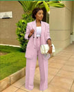 Pink structured blazer and straight-leg trouser suit set, single-breasted front