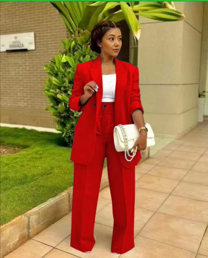Red structured blazer and straight-leg trouser suit set, single-breasted front