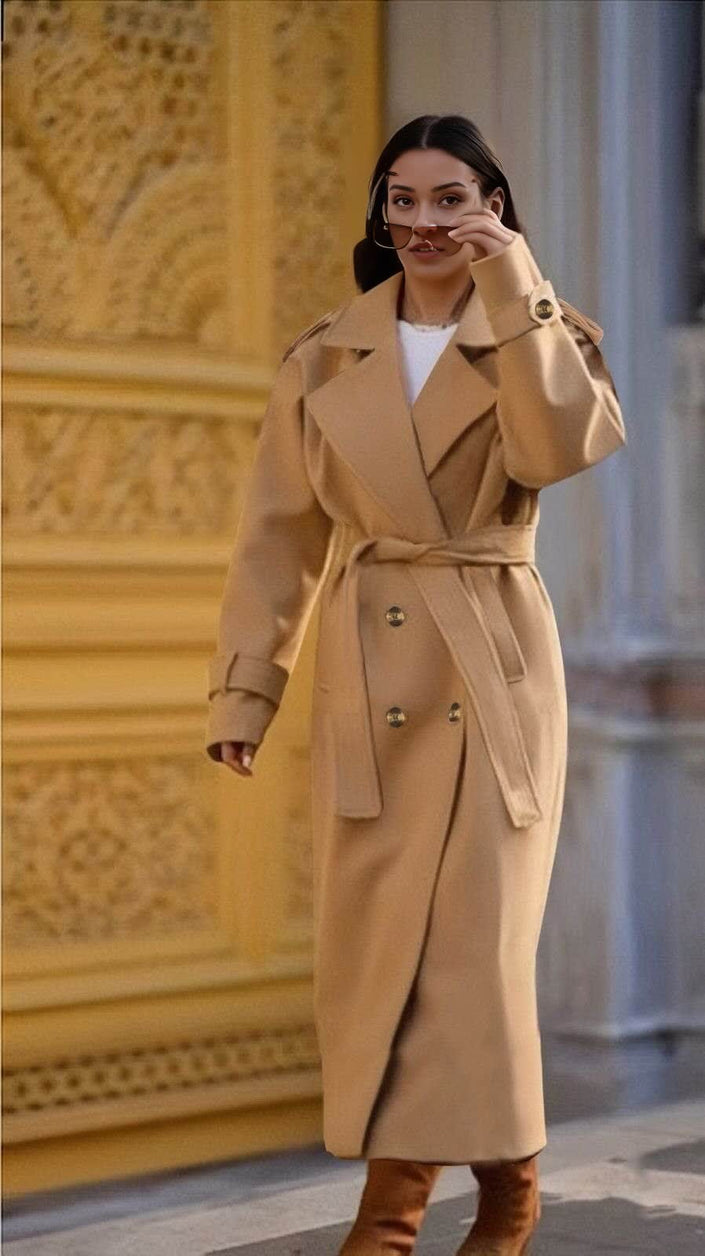 Beige oversized belted double-breasted coat with notched lapels and long sleeves