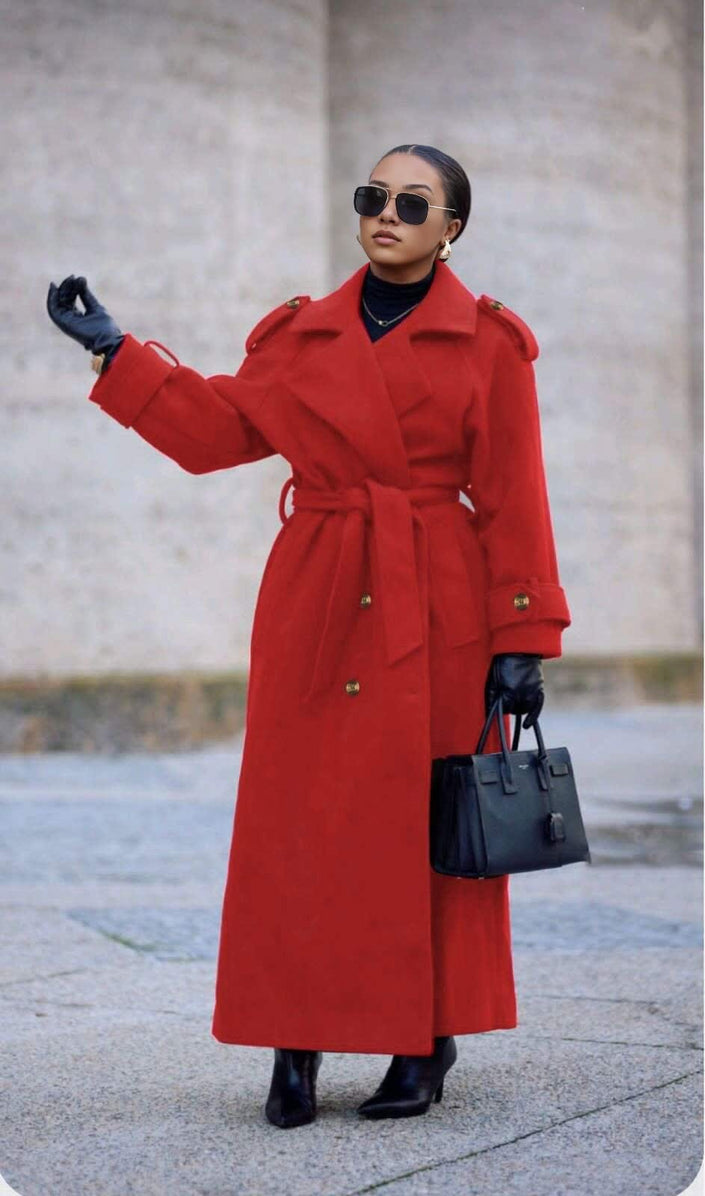 Red oversized belted double-breasted coat with notched lapels and gold buttons