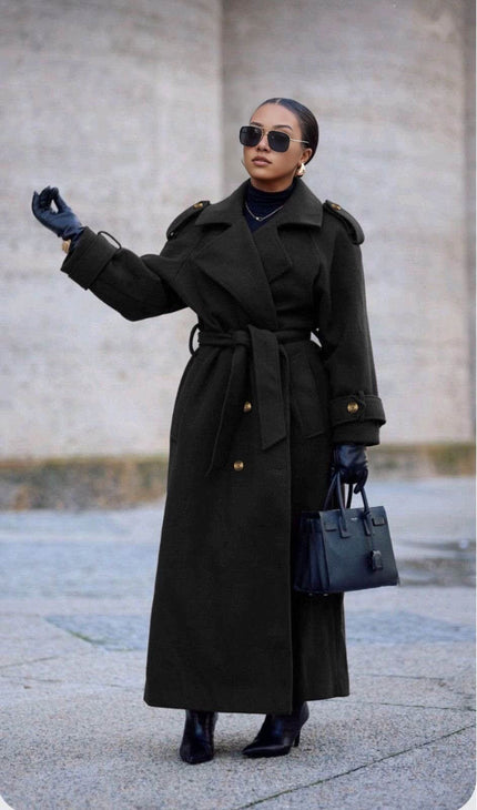 Black oversized belted double-breasted coat with notched lapels and buttoned cuffs