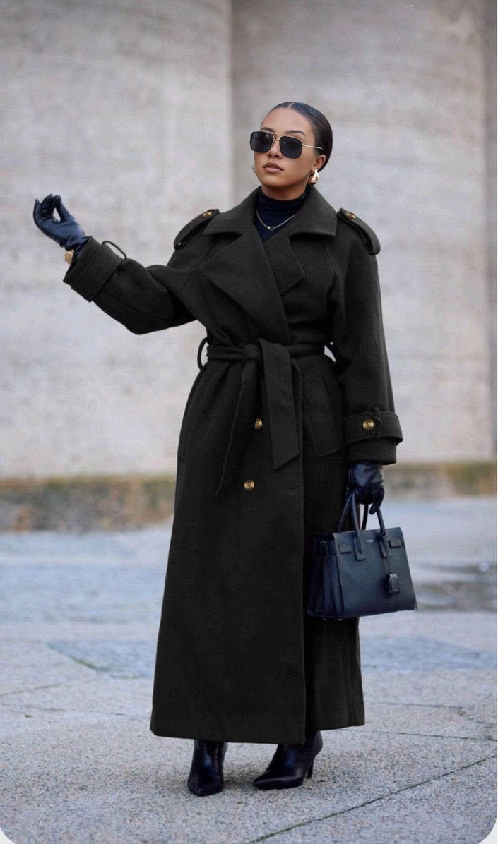 Black oversized belted double-breasted coat with notched lapels and buttoned cuffs