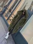 Army green plush hooded coat with wide pockets and relaxed loose fit