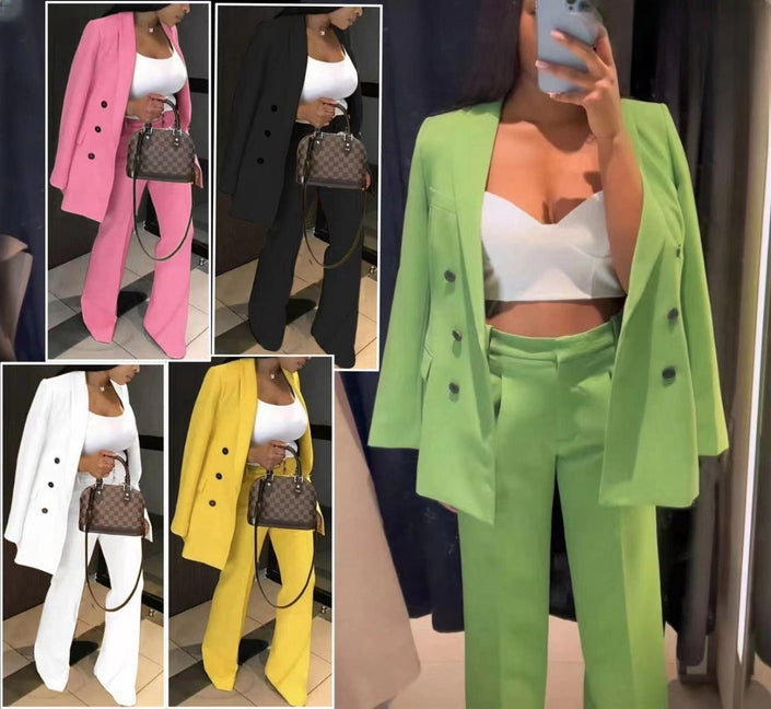 Green double-breasted blazer suit with matching trousers, black button detail