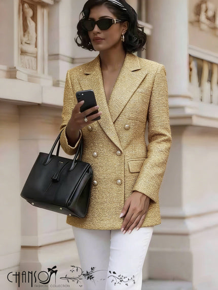 Gold double-breasted textured blazer with notch lapels and decorative buttons
