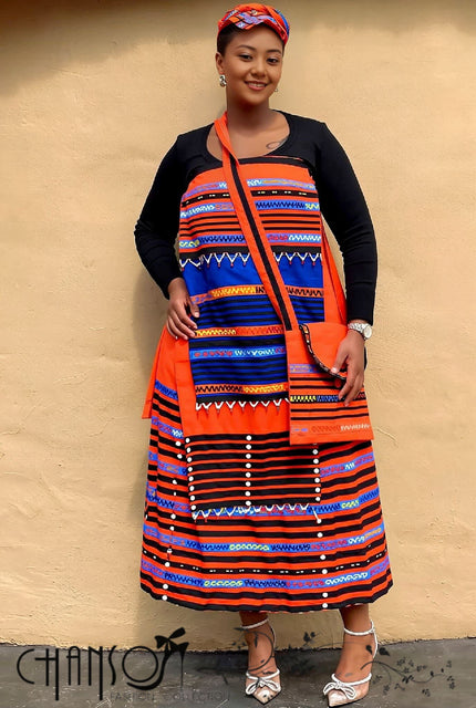 Geometric print maxi skirt set with orange and blue stripes, white dot button trim