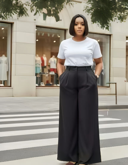 High-waist wide-leg pants in black with front button and zip closure