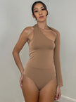 Tan one-shoulder long-sleeve bodysuit with asymmetrical neckline and high-cut leg