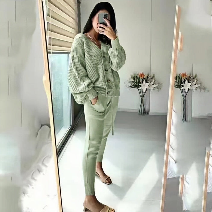 Knit twin set cardigan and slim trousers, sage green cable-knit cardigan and fitted trousers