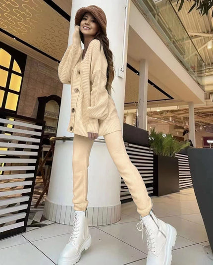 Knit twin set cardigan and slim trousers, cream cable-knit cardigan and slim cream pants
