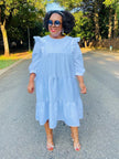 White midi ruffle-tier dress, loose fit, puff sleeves, ruffled hem