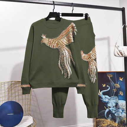 Dark-olive-green knit twin set with gold sequin bird motif on long-sleeve top and pants