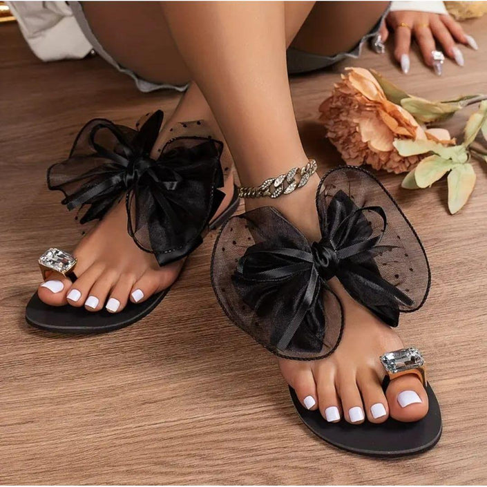 Black womens sandals with large tulle bow and rhinestone straps, open toe