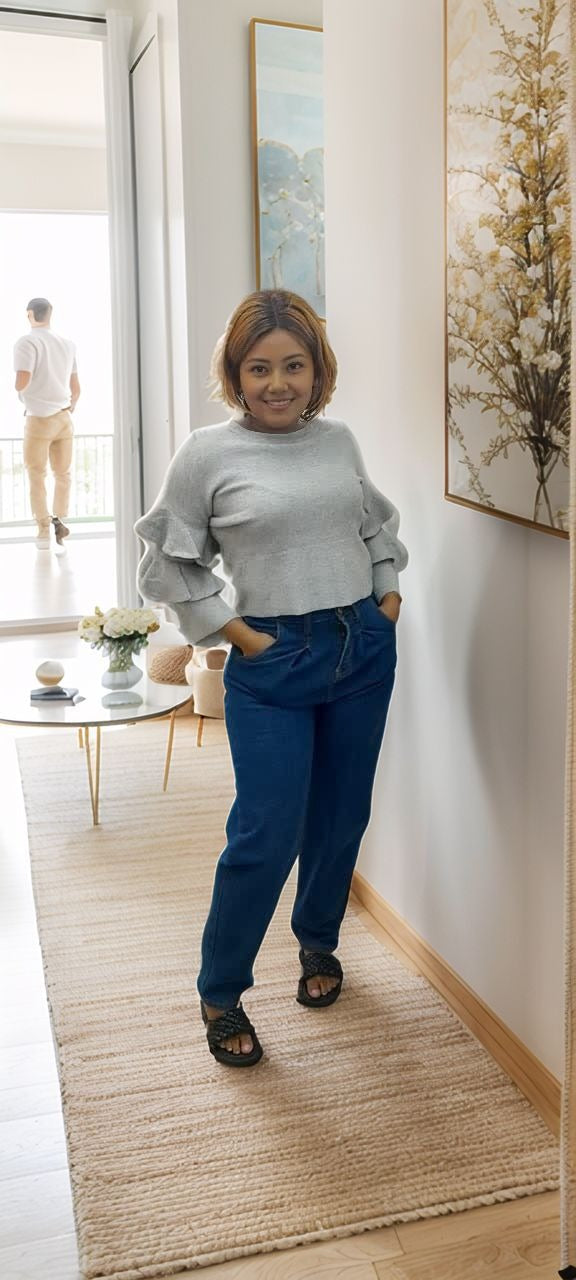 Light gray knit top with layered sleeves and crew neckline