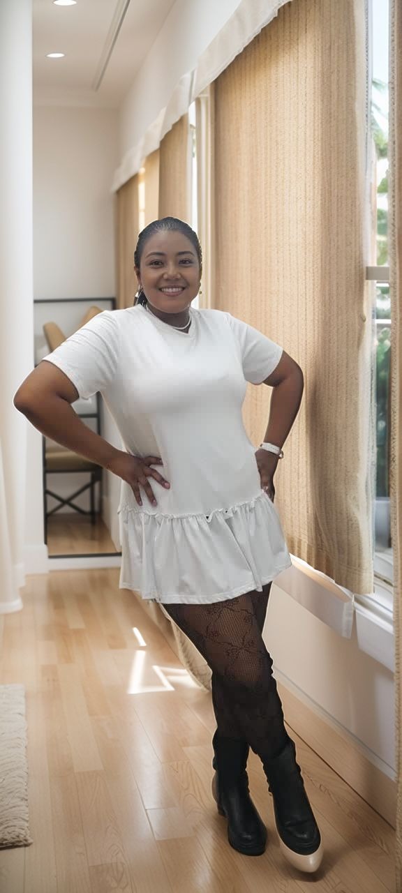 White mini dress with short sleeves and ruffled hem