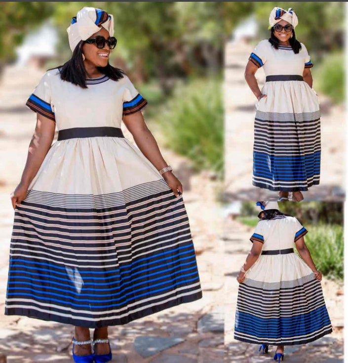 Striped A-line dress with short sleeves, white bodice and navy-blue striped skirt