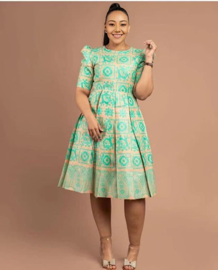 Green printed puff-sleeve midi dress with fit-and-flare skirt and round neckline