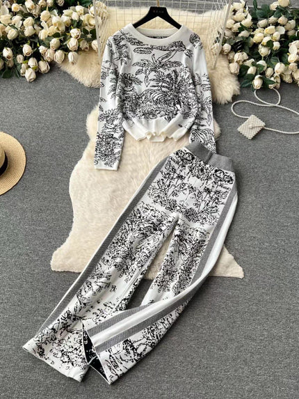 Botanical printed two-piece set: white long-sleeve top and wide-leg pants, black contrast trim