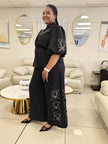 Black floral embroidered wide-leg twin set with puff sleeves and tie-waist top