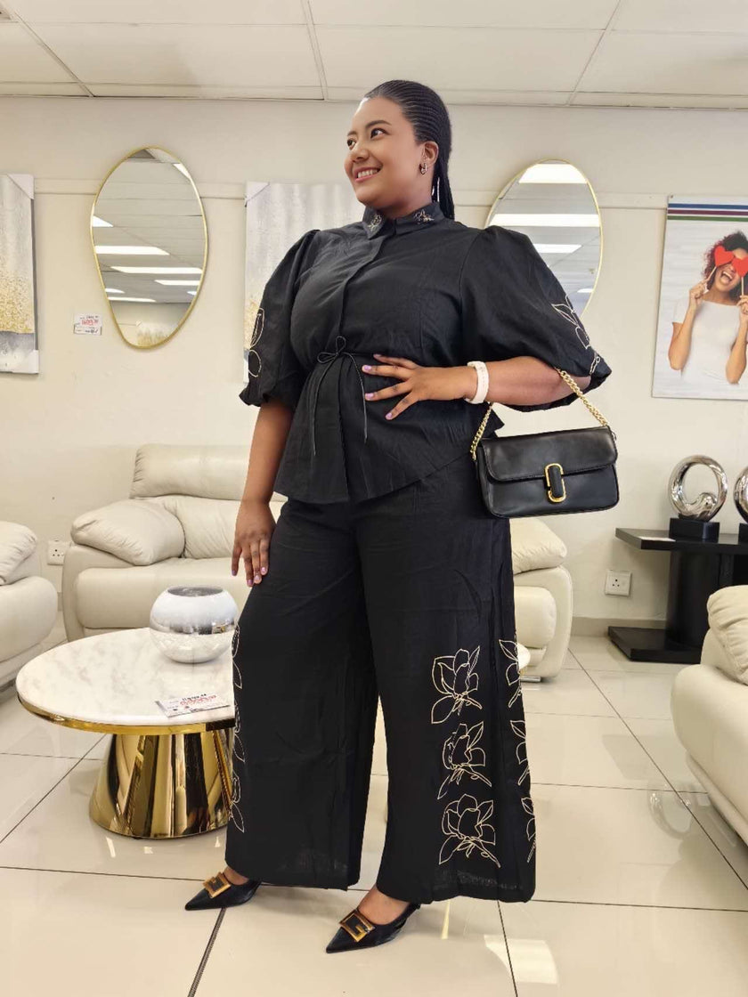 Black floral embroidered puff-sleeve twin set with wide-leg pants