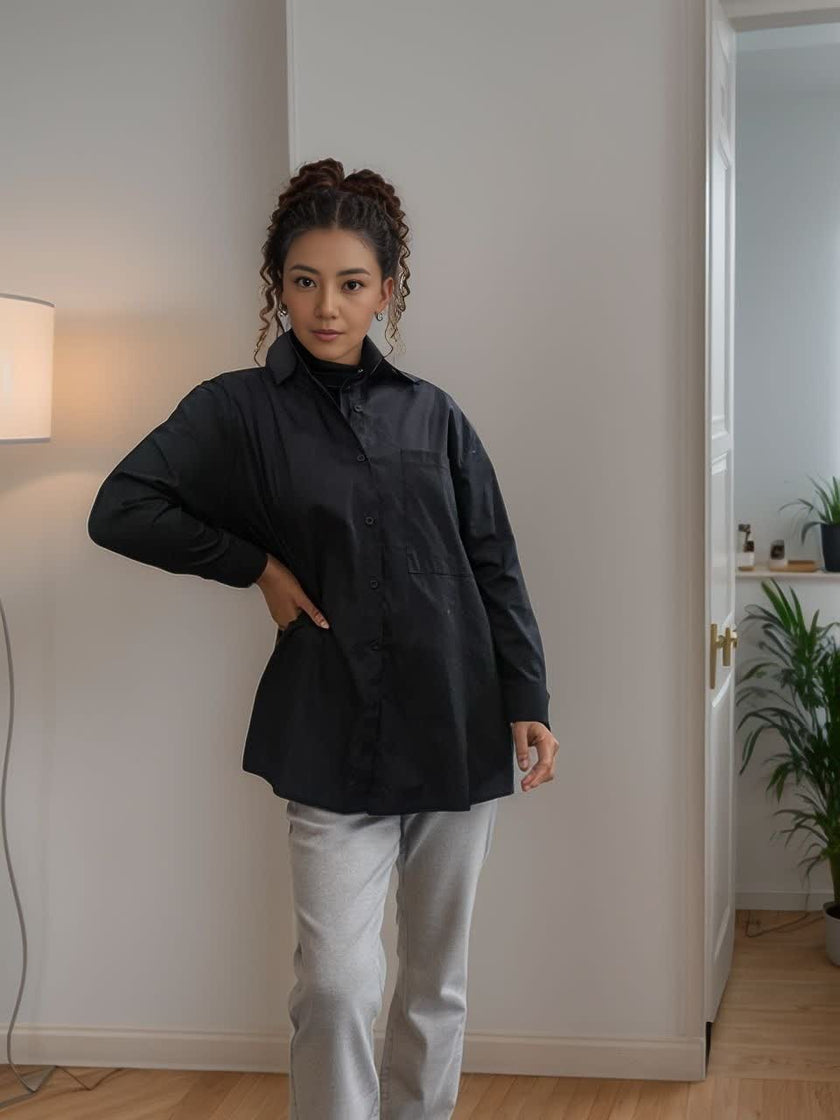 Relaxed fit shirt in black, button-front long sleeves and relaxed drape