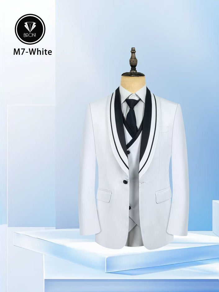 White tuxedo suit with shawl lapels and black trim, includes vest and bow tie
