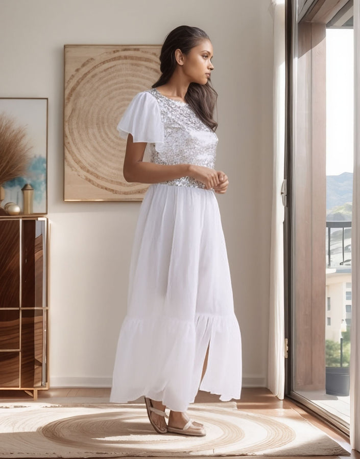 White sequin flutter maxi dress with flutter cap sleeves and layered flowing skirt