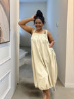 Cream utility maxi dress with square straps, gathered bodice, and drawstring waist