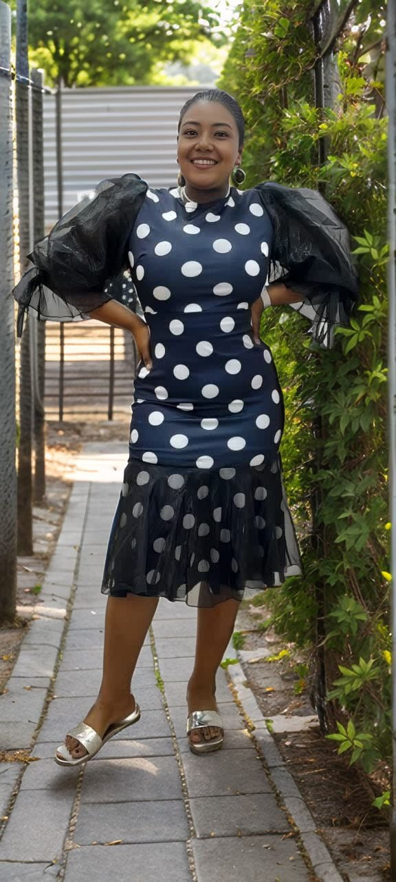Polka dot mesh dress with puff sleeves, navy and white dots, flared skirt