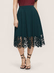 High-waist midi skirt with lace hem, dark green and floral cutout border