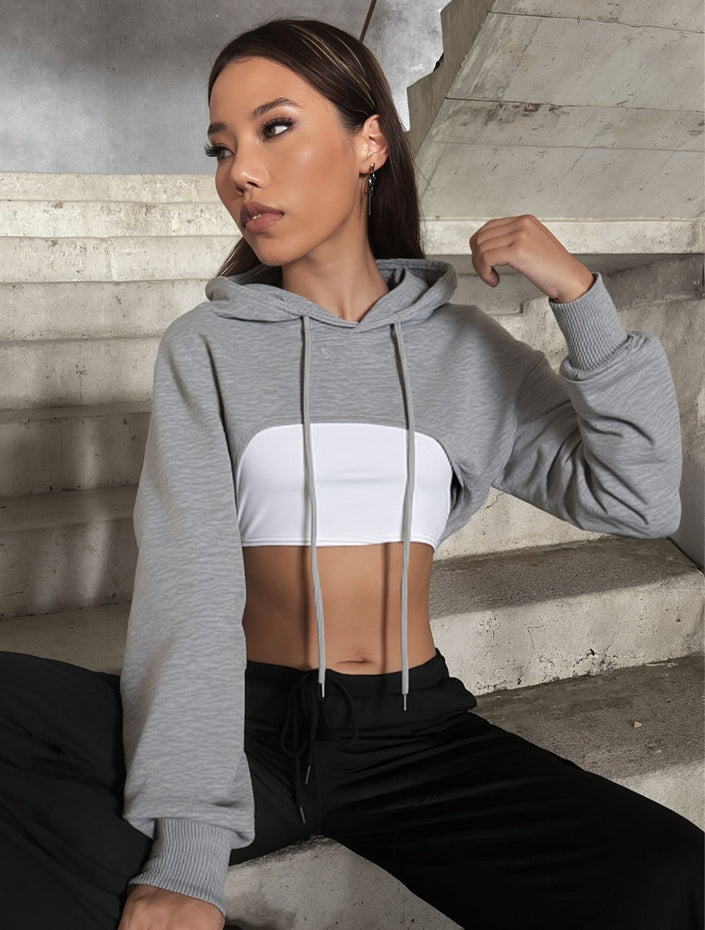Grey off-shoulder cropped hoodie with drawstring hood and long sleeves