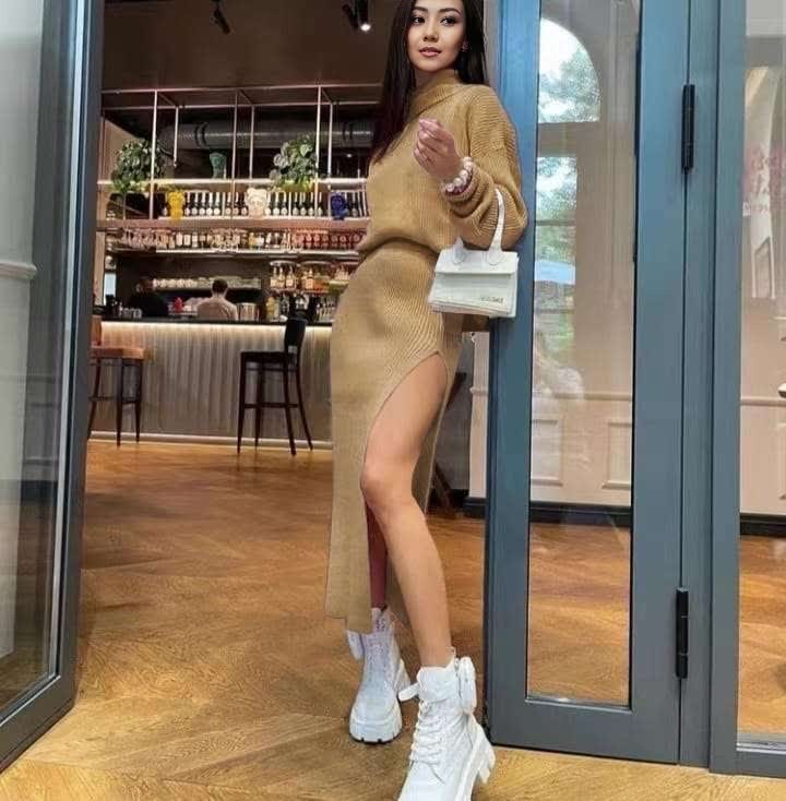 Tan bodycon knit midi dress with long sleeves and side slit