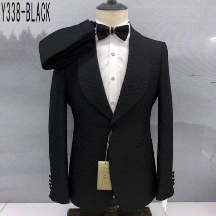Black tuxedo jacket with shawl lapels and subtle sparkle texture, front button closure